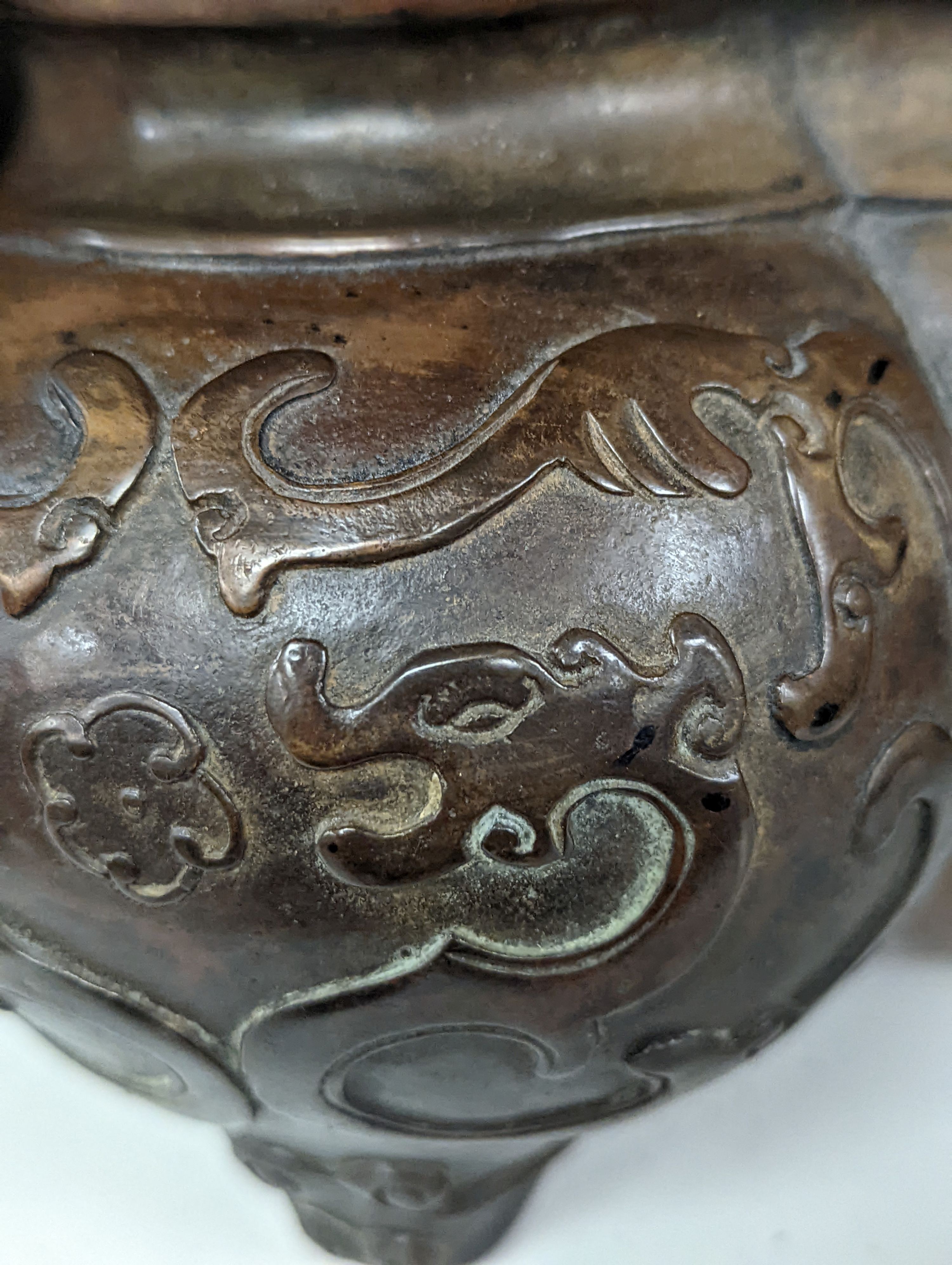 A 19th century Chinese bronze quatrefoil censer, with four character mark - 19cm high